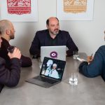 Morris Misel leading a strategic AI and foresight session with a team of professionals around a table