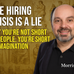 Morris Misel stands confidently in front of a collage depicting the evolution of work throughout history, alongside bold text that reads “The Hiring Crisis Is a Lie – Why You’re Not Short of People, You’re Short of Imagination.