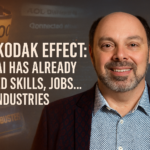Morris Misel smiling in a professional portrait, with ghostlike overlays of Kodak film, an AOL modem screen, a Blockbuster card, and a Nokia phone fading into the background alongside digital AI signals. Text overlay reads: “The Kodak Effect: How AI Has Already Erased Skills, Jobs… and Industries.