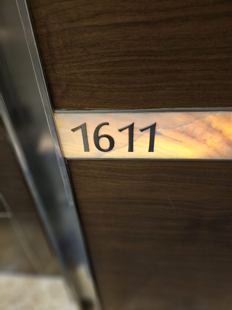 Hotel door ritual photograph by Morris Misel.