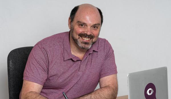 Morris Misel, foresight strategist, analysing financial systems and capital allocation signals at his desk while preparing strategic insights.
